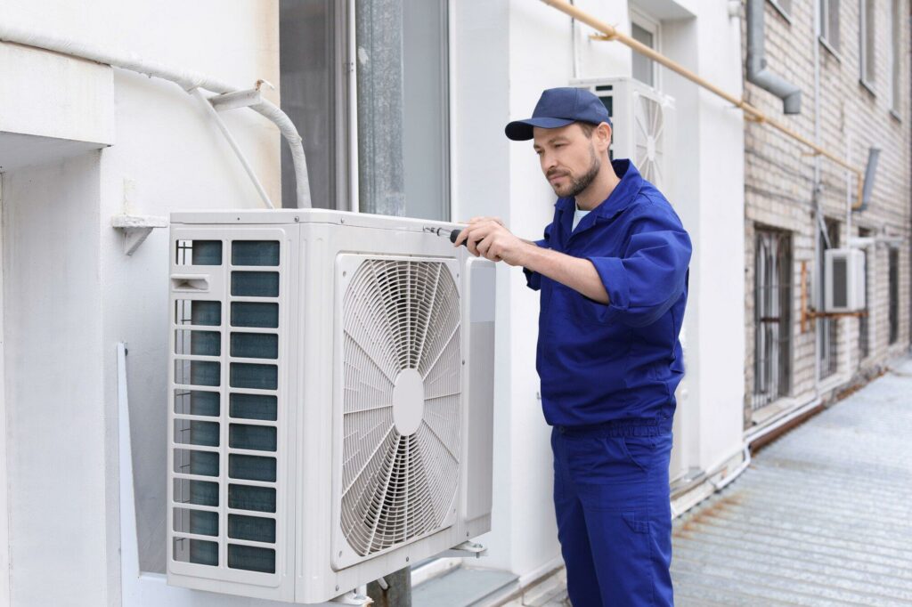 male technician repairing air 1024x682